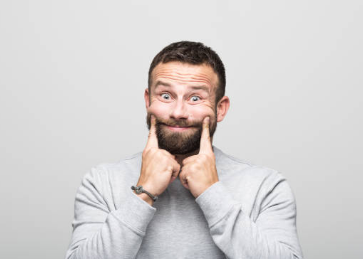 Portraits of friendly bearded man