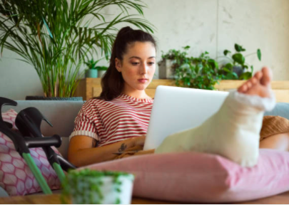 Young woman with broken leg