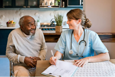 Home caregiver with elderly couple